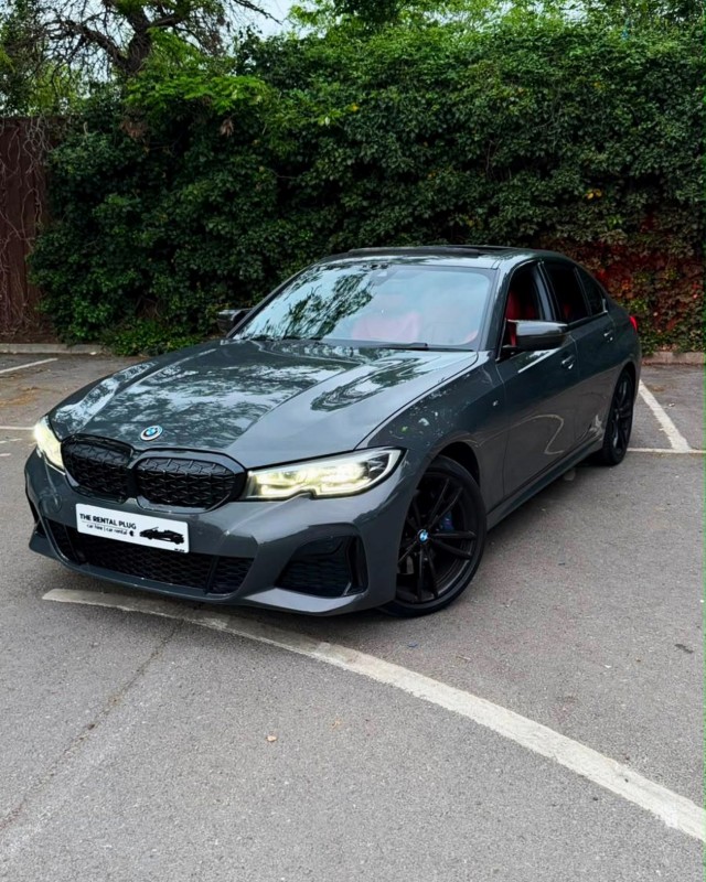 BMW M340i — red quilted leather